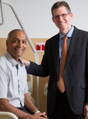 Dr Charles Brooker with Jaswir Grewal, who has perceived a spinal make to soothe behind pain, during Royal North Shore Hospital in St Leonards.