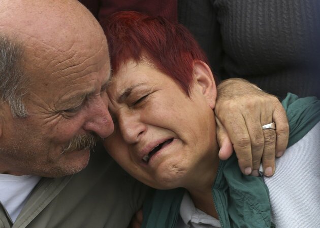 span class='image-component__caption' itemprop=captionRelatives cry during a Oct. 11, 2015, wake of Korkmaz Tedik, 25, killed in a bombing attacks in Ankara, Turkey, a day before./span